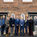 First handovers at Fairham l-r Cllr Upton, Rachel Hull Homes England, James Naish MP, Lee Parry Vistry, Cllr Clarke, Kath Marriot, RBC, Vickie Robb emh and Peter Hall Gatehouse