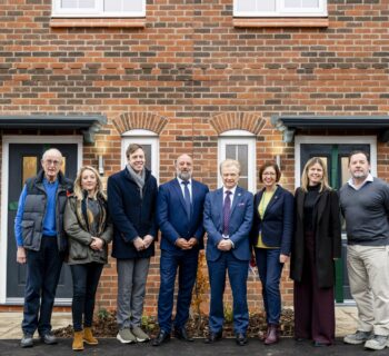 First handovers at Fairham l-r Cllr Upton, Rachel Hull Homes England, James Naish MP, Lee Parry Vistry, Cllr Clarke, Kath Marriot, RBC, Vickie Robb emh and Peter Hall Gatehouse