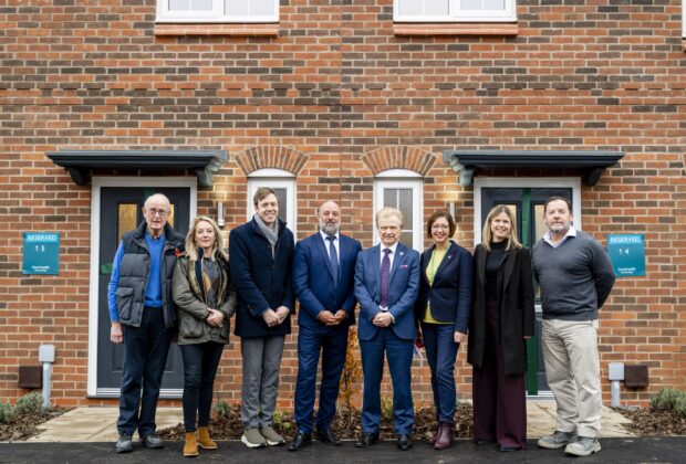 First handovers at Fairham l-r Cllr Upton, Rachel Hull Homes England, James Naish MP, Lee Parry Vistry, Cllr Clarke, Kath Marriot, RBC, Vickie Robb emh and Peter Hall Gatehouse